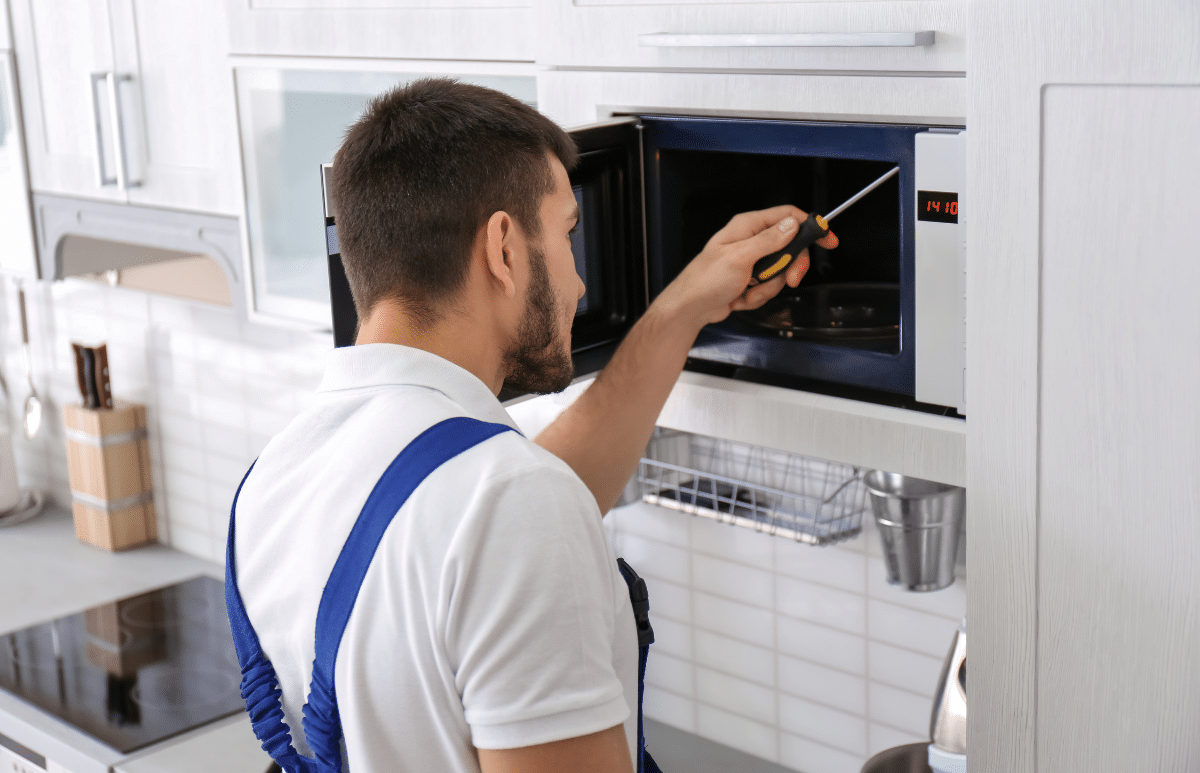 Microwave repair East Valley AZ — E&J Appliance Service Company technician